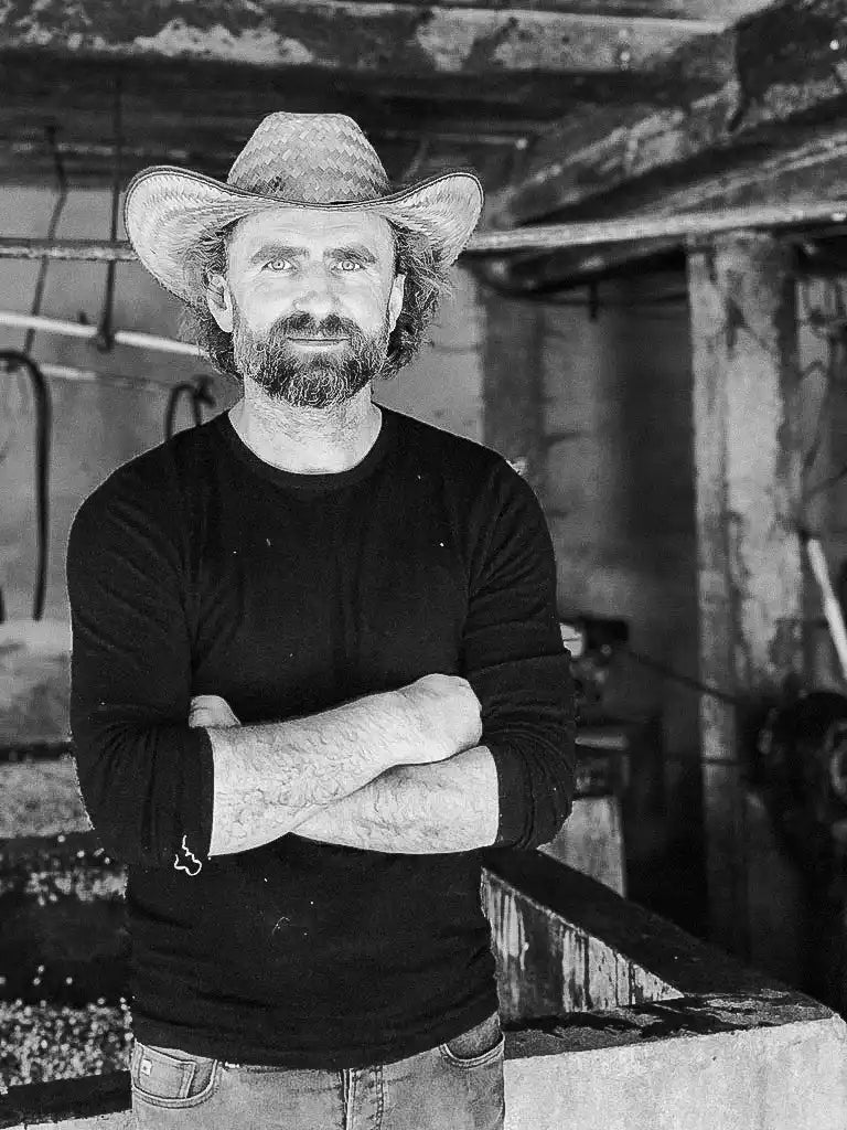 Man in cowboy hat.